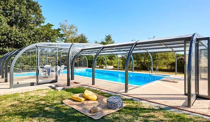 Abri de piscine Elliptik Haut à panneaux relevables  