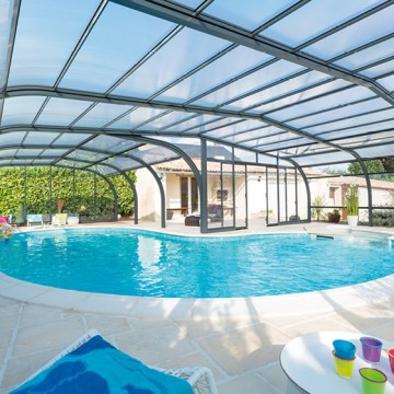 Abri de piscine Elliptik Haut à panneaux relevables