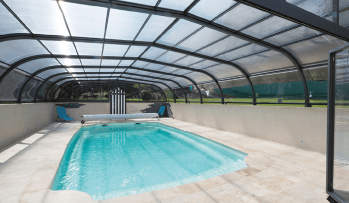 Abri de piscine Elliptik Haut à panneaux relevables 