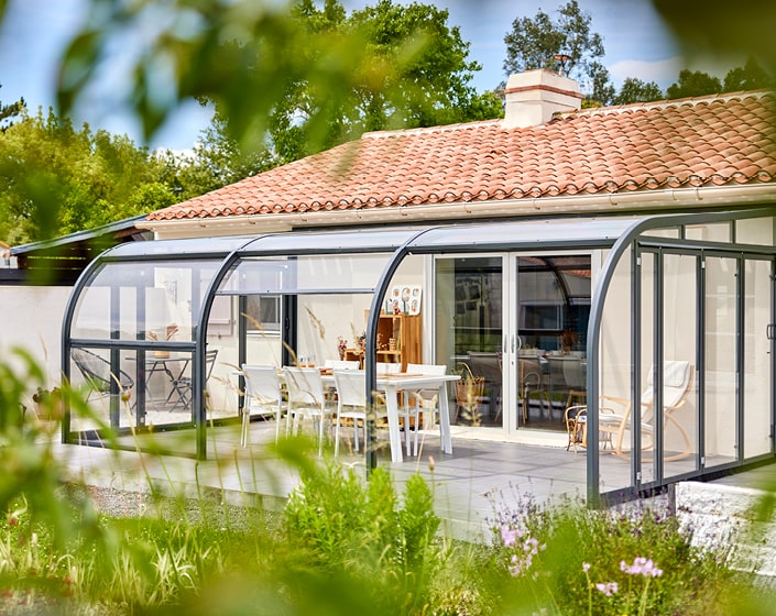 Abri de terrasse Panoramik à panneaux relevables