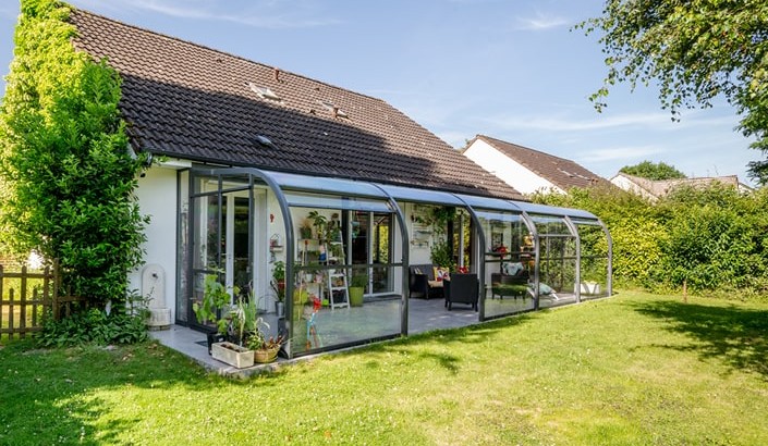 Abri de terrasse Panoramik à panneaux relevables 