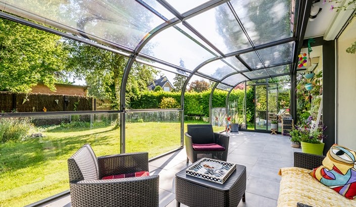 Abri de terrasse Panoramik à panneaux relevables