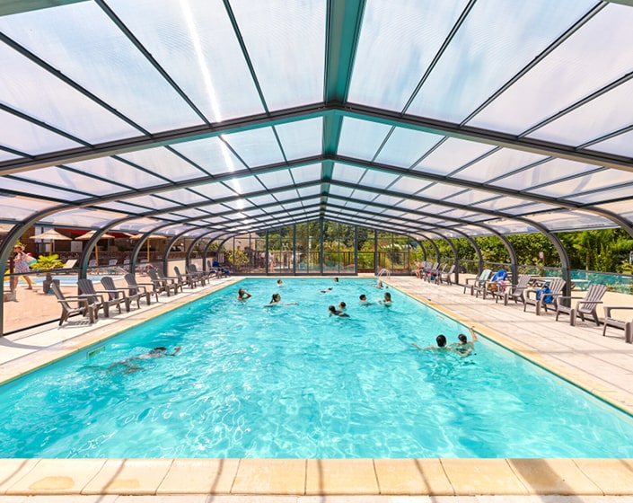 Abri de piscine Elliptik Haut à panneaux relevables