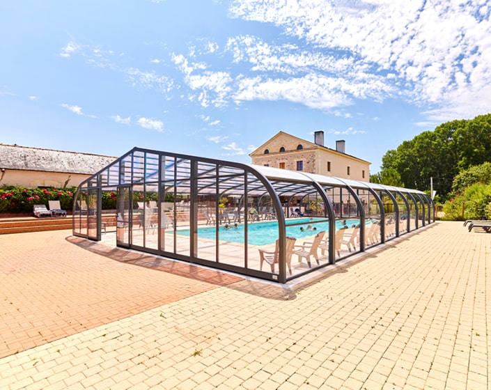 Abri de piscine Elliptik Haut à panneaux relevables