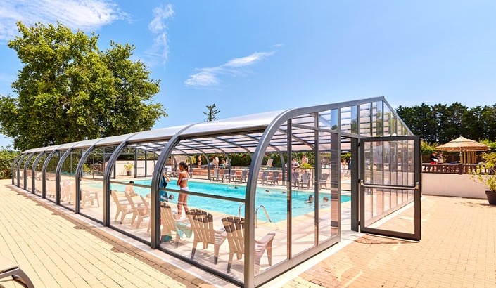 Abri de piscine Elliptik Haut à panneaux relevables