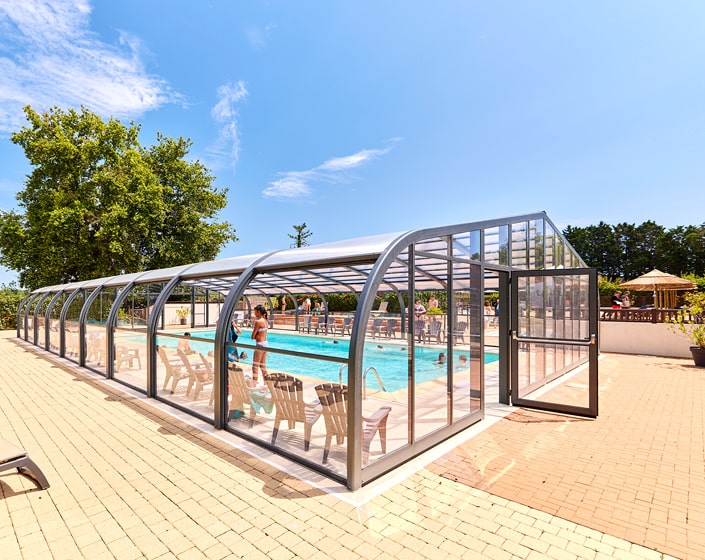 Abri de piscine Elliptik Haut à panneaux relevables