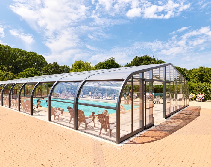 Abri de piscine Elliptik Haut à panneaux relevables
